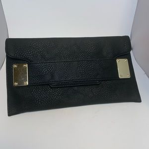 5/$25 - NWOT No brand black clutch